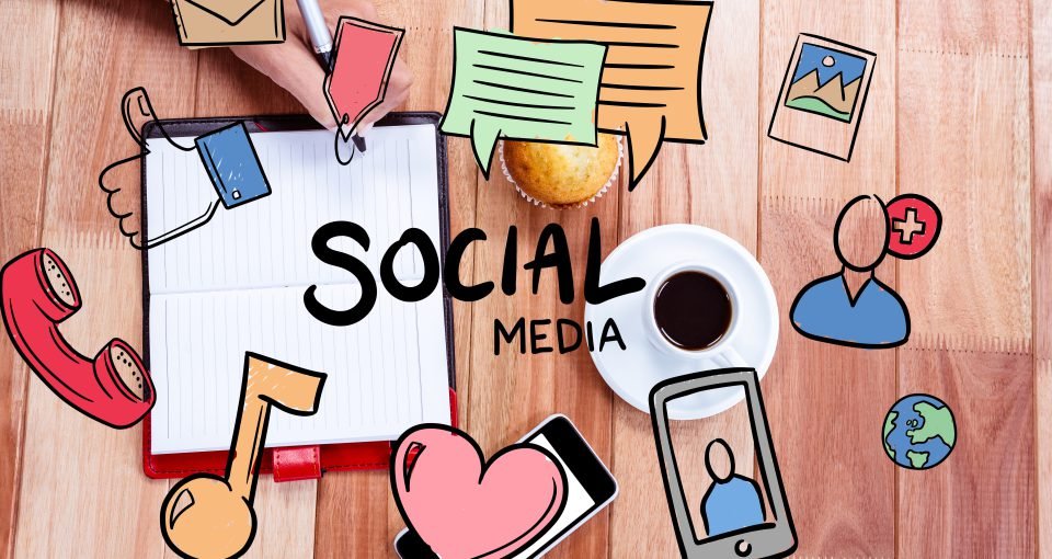 digital composite of hands using notebook with graphics